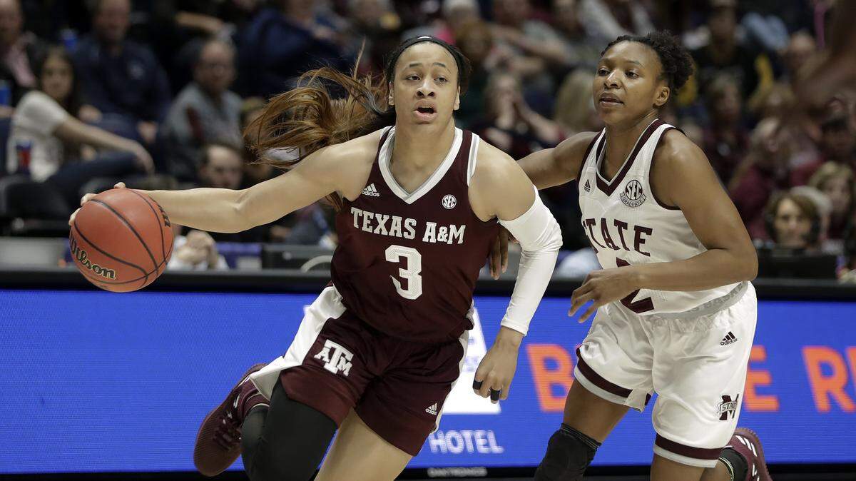 Texas A&M’s Chennedy Carter drives against Mississippi State’s Morgan William in the SEC tournament semifinal game. Carter, a Mansfield Timberview graduate, was USA Today’s selection for women’s freshman of the year.
