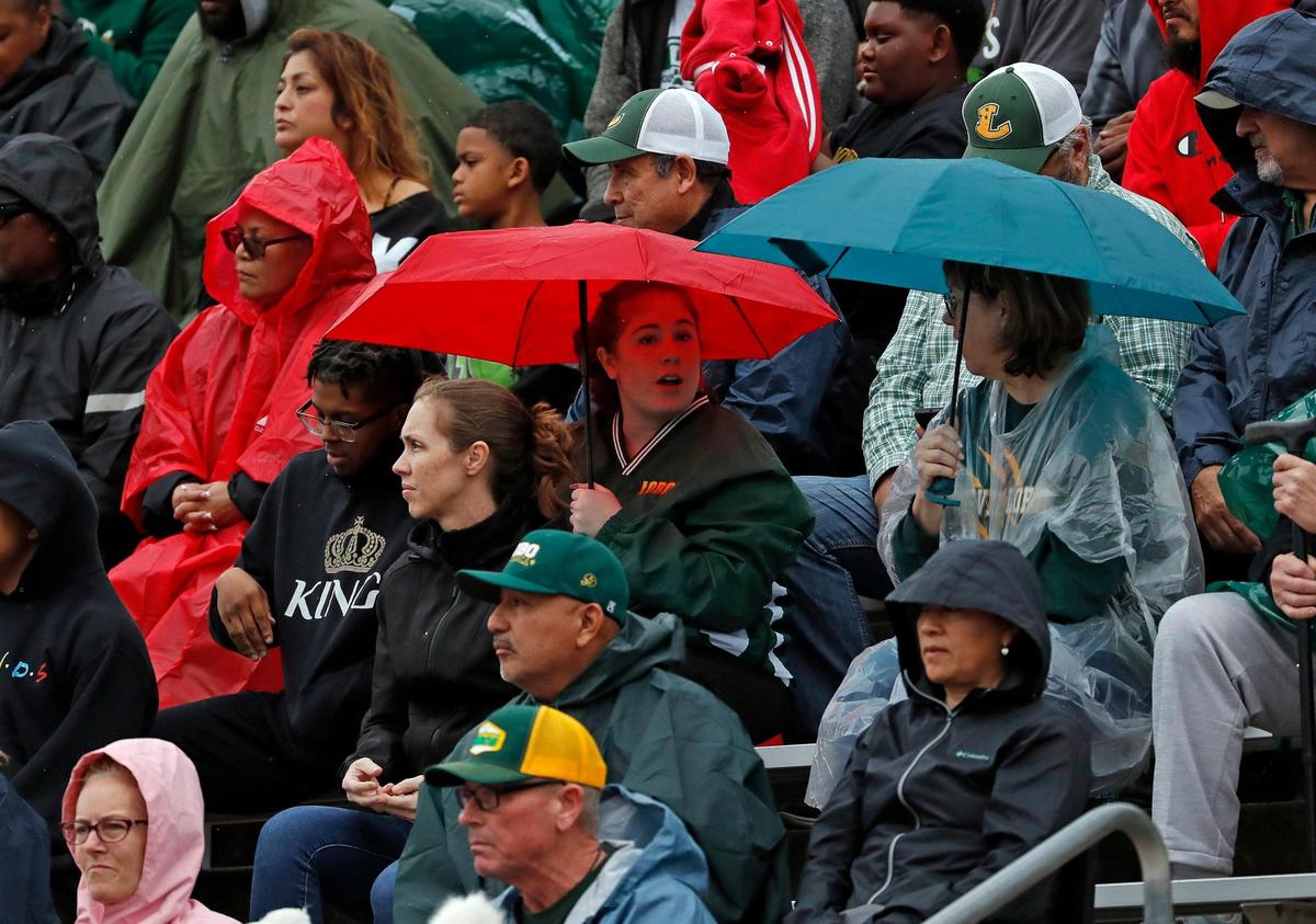 Longview fans braved the rain in the first half of a UIL Class 5A D1 state semifinal football game at the John Kincaide Stadium in Dallas, Texas, Saturday, Dec. 10, 2022. Longview led Aledo at the half 14-3. (Special to the Star-Telegram Bob Booth)