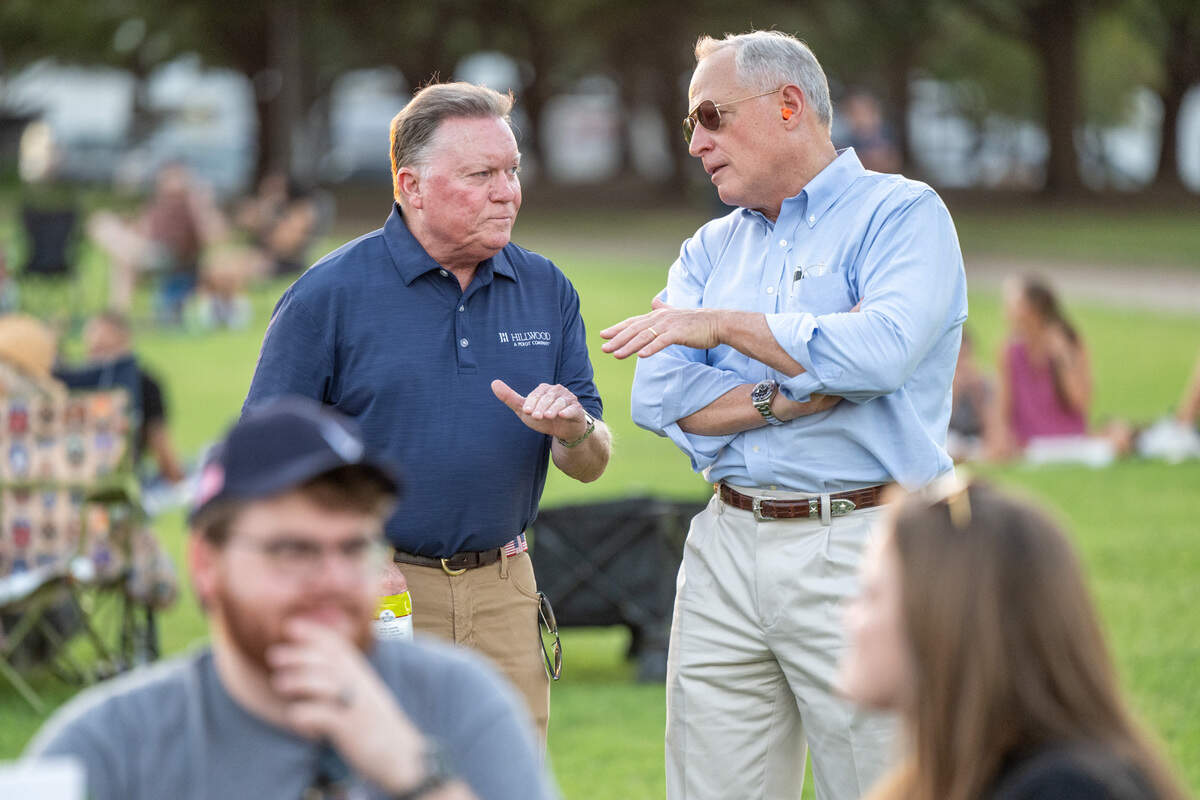 Hillwood president Mike Berry and chairman Ross Perot Jr. talk at Alliance’s 35th anniversary celebration.