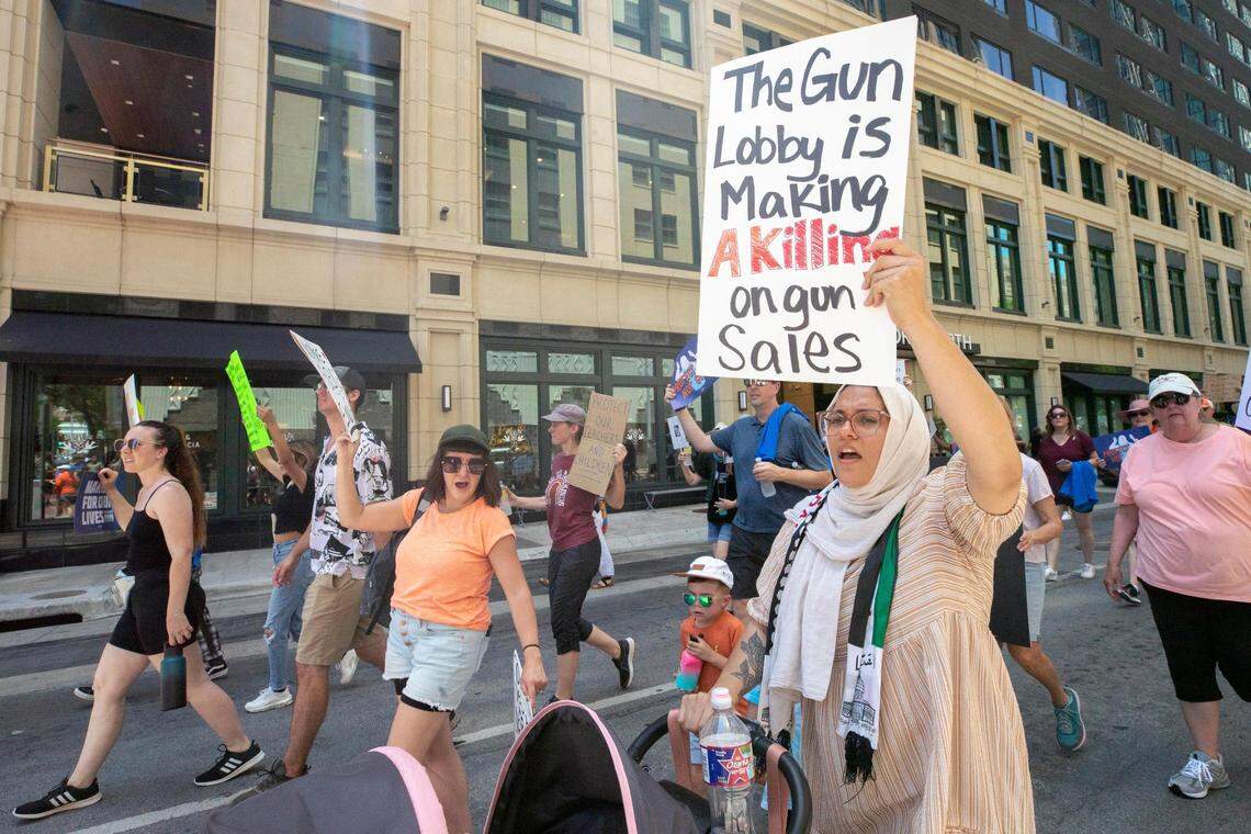 Jackalyn Hernandez, 27, attends the March for Our Lives rally with her one and five-year-old children in downtown Fort Worth, Texas, on Saturday, June 11, 2022.