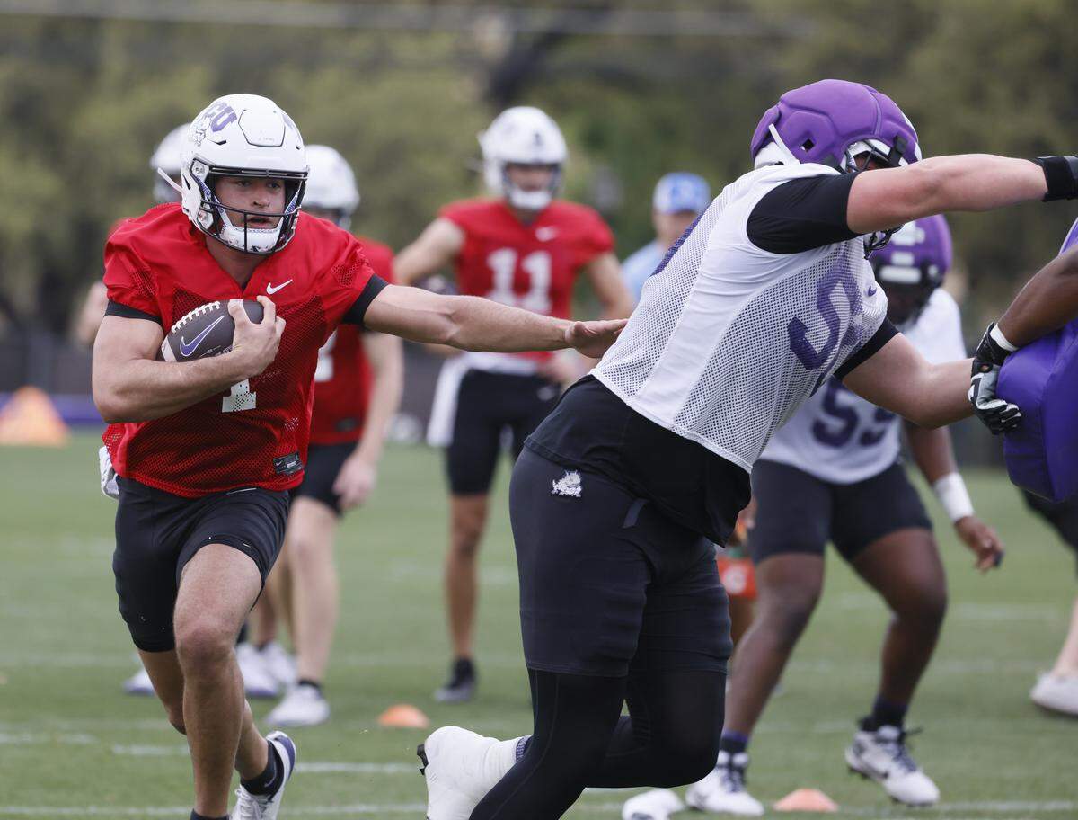 TCU quarterback Jaden Craig runs a keeper near the goal line during the first day of Spring football practice at TCU in Fort Worth, Texas, Tuesday, March, 24, 2026.