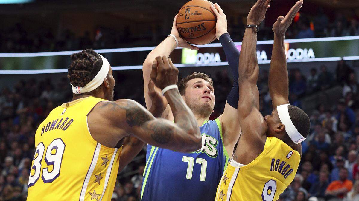 The Dallas Mavericks figure to be a playoff team with Luka Doncic, here driving against the L.A. Lakers in a loss on Friday night. The Mavs would like to add a few pieces around him. (AP Photo/Richard W. Rodriguez)