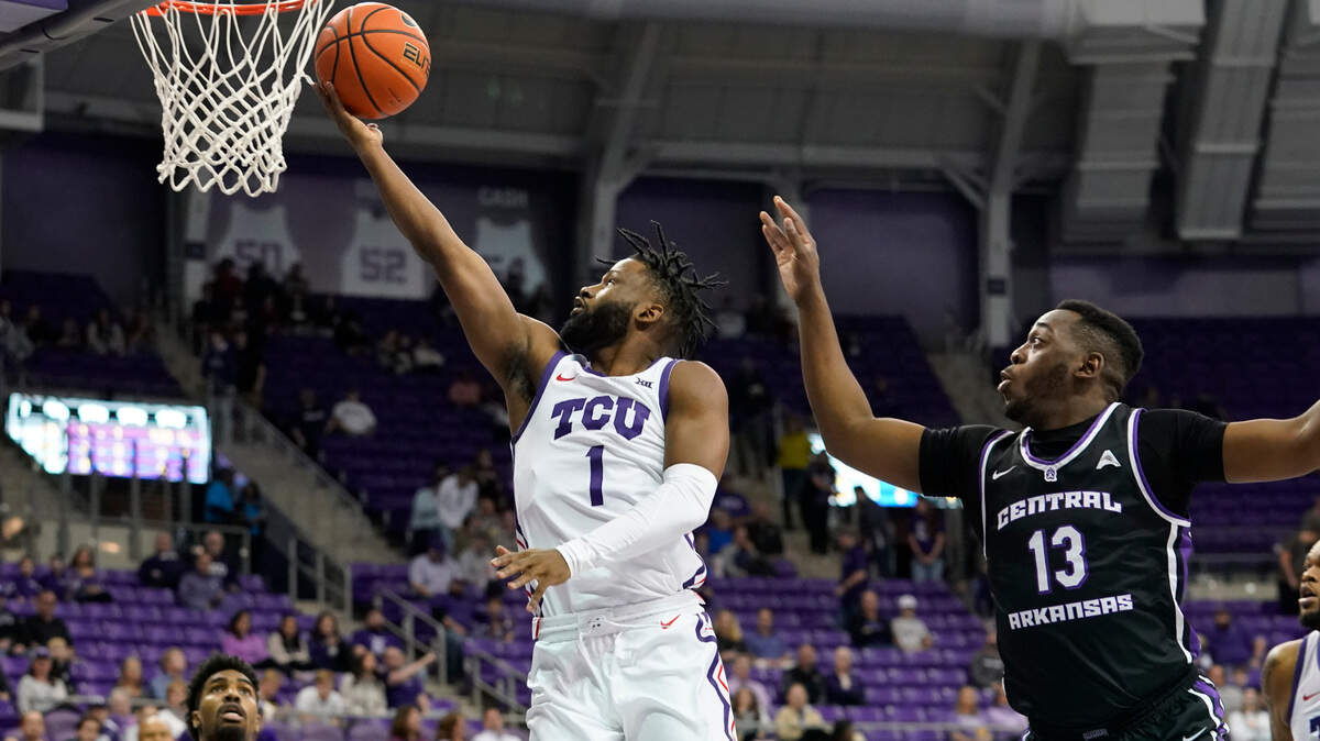 TCU guard Mike Miles Jr. (1) shoots against Central Arkansas guard Eddy Kayouloud (13) during their game on Wednesday.
