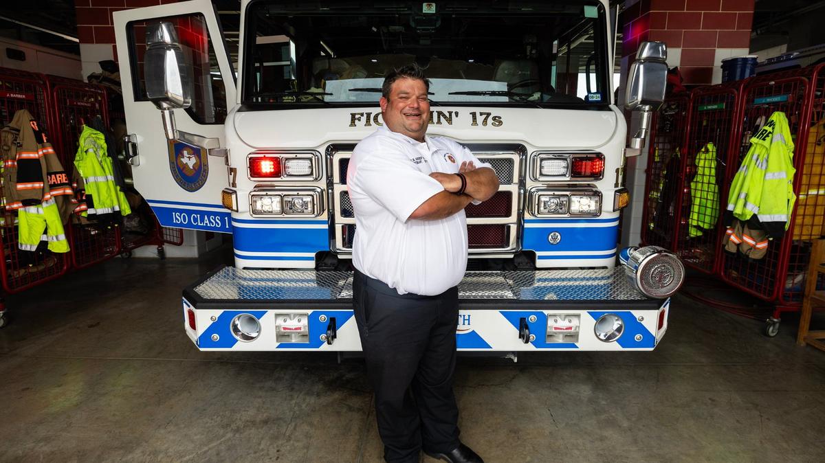 Fort Worth Fire Department Lt. Sam Greif Jr. is photographed in a fire engine truck at Fort Worth Fire Station 17 in the Bob Bolen Public Safety Complex in Fort Worth on July 23.