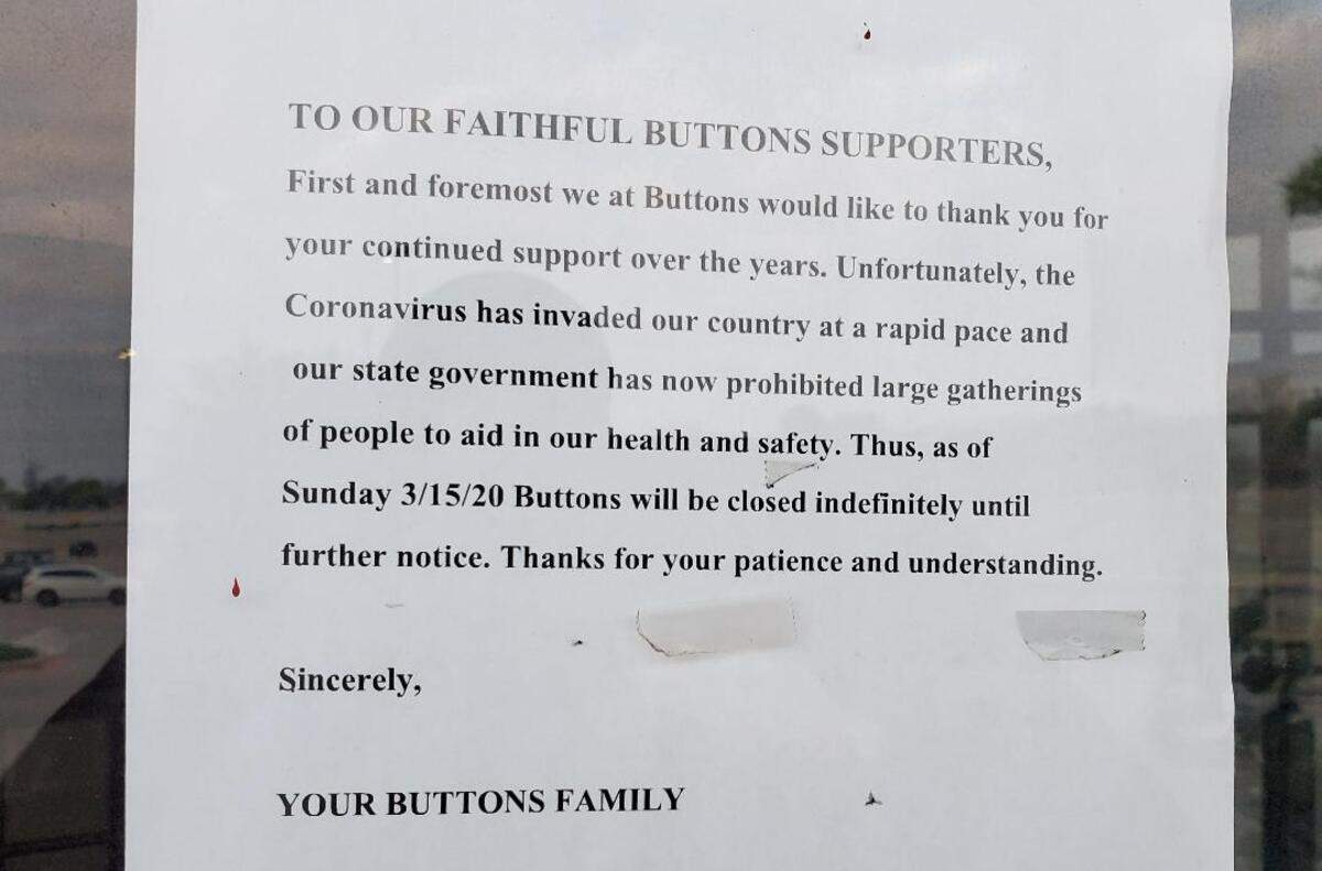 Buttons Restaurant has closed due to COVID-19 and posted this message on its door.