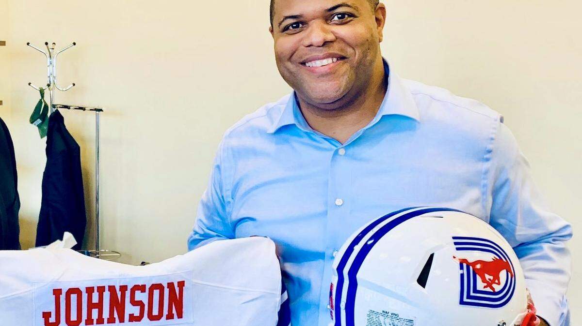 Dallas Mayor Eric Johnson shows off Dallas’ emblem on SMU’s jerseys and helmet. Johnson called out Fort Worth Mayor Mattie Parker ahead of Saturday’s game between TCU and SMU.