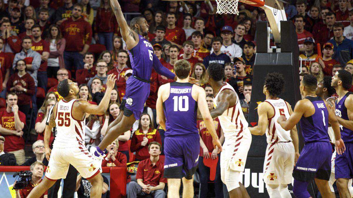 TCU's JD Miller (15) dunks on Iowa State during the first half of an NCAA college basketball game, Wednesday, Feb. 21, 2018, in Ames, Iowa.