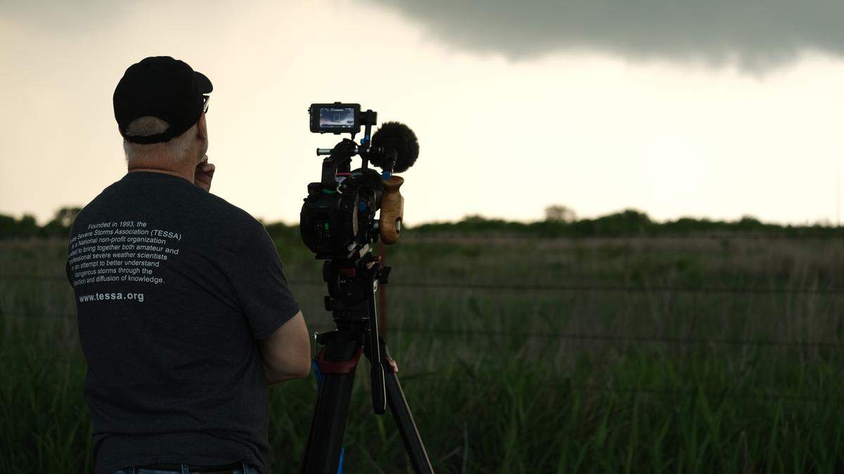 Storm chaser and filmmaker Martin Lisius watched the skies, camera at the ready, while following a storm near Wichita Falls, Texas on April 26, 2026.