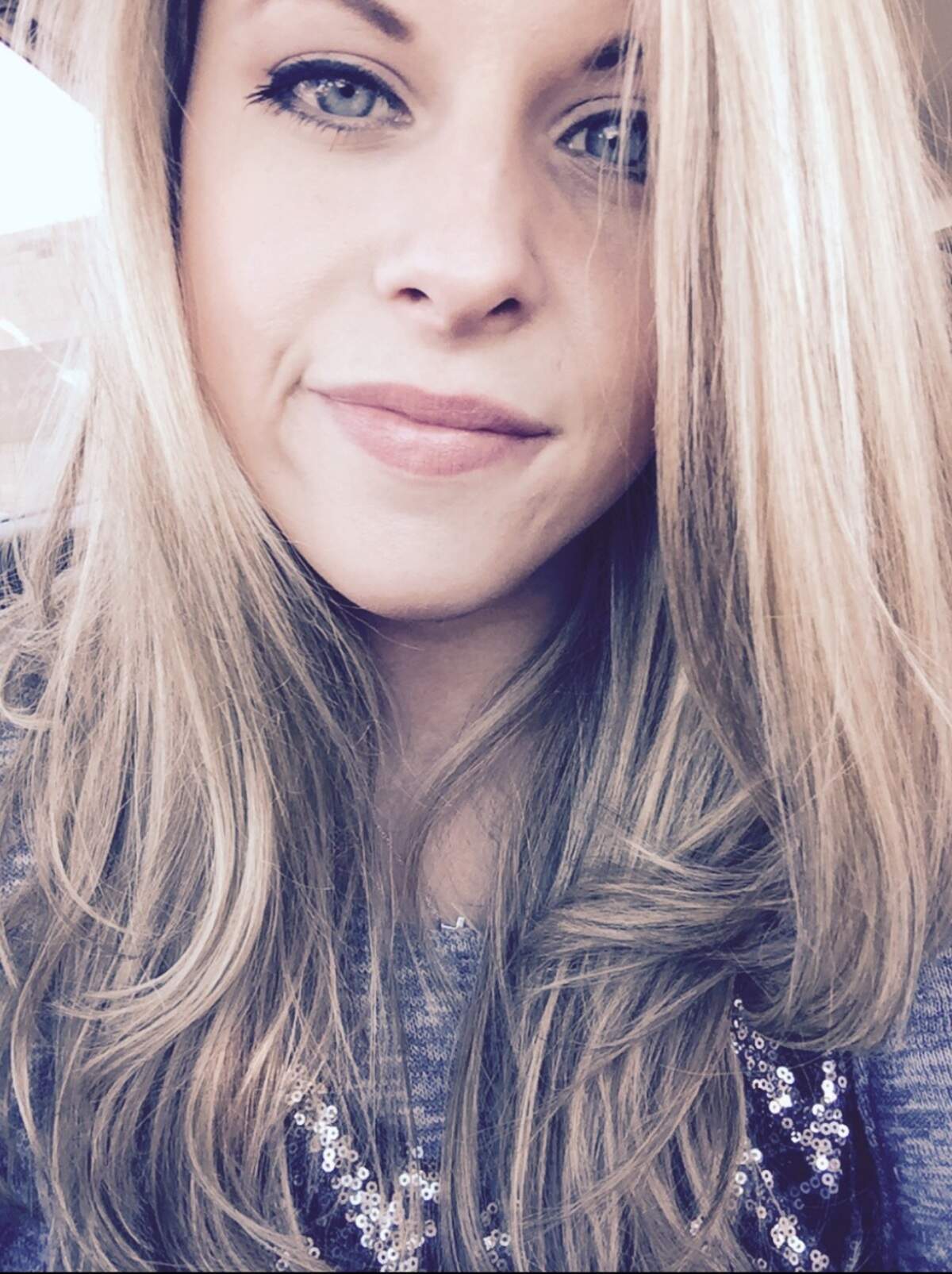 24-year-old Rachel Rhoads, whose body was found "badly burned" near Farm Road 726 in East Texas was strangled to death, according to the Upshur County medical examiner.