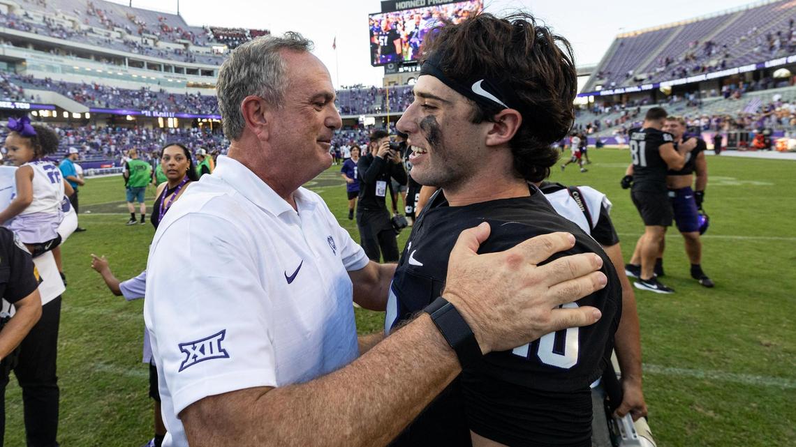 TCU Head Coach Sonny Dykes and quarterback Josh Hoover (10) embrace after winning 35-34 in an NCAA football game between TCU and Texas Tech at Amon G. Carter Stadium in Fort Worth on Saturday, Oct. 26, 2024.