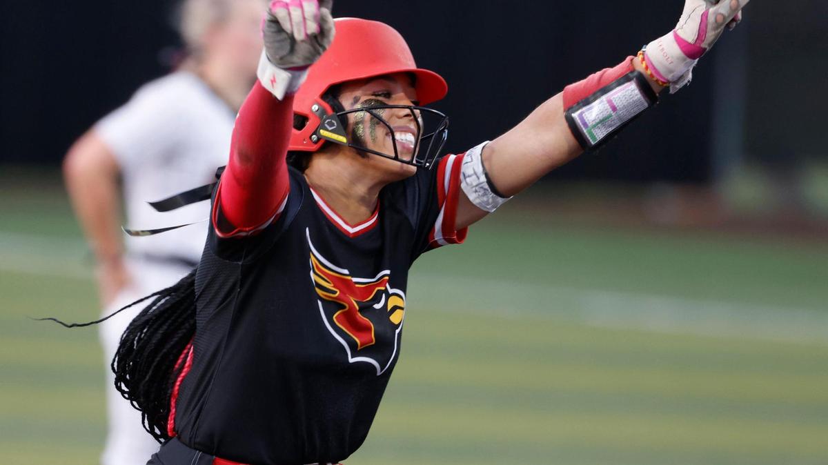 Melissa center fielder Finlee Williams (2) celebrates her second home run as she rounds second during the UIL softball state semifinals 5A D1 playoff game at Trojan Softball Field in Euless, Texas, Wednesday, May 21, 2025.