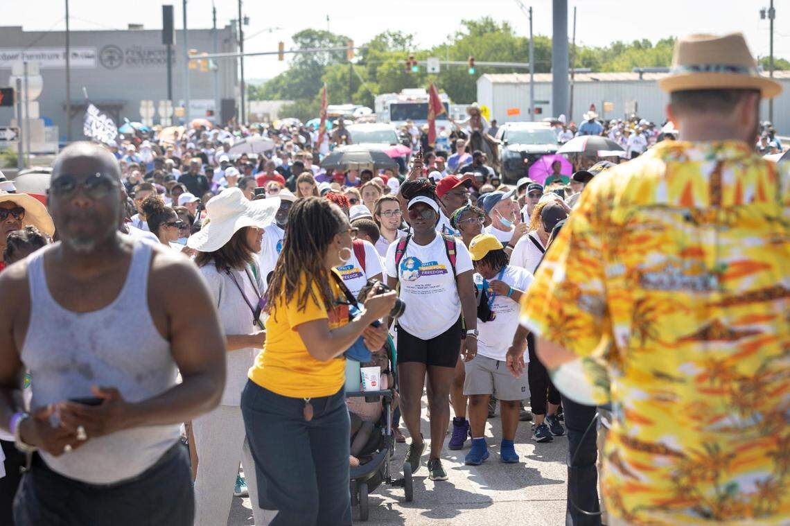 Hundreds of people gathered with Juneteenth activist Opal Lee to march from her neighborhood to City Hall on Saturday, June 18, 2022, in Fort Worth, Texas. Lee was integral to the recognition of Juneteenth as a federal holiday, and marched 2.5 miles to represent the 2.5 years enslaved African-Americans waited for their freedom after the Emancipation Proclamation of 1863.