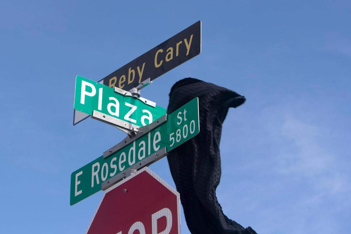 A street sign in honor of Reby Cary is unveiled in Fort Worth, Texas, on Saturday, July 30, 2022. Cary was the first African American elected to the Fort Worth ISD Board of Education and to be hired as a professor at UT Arlington.