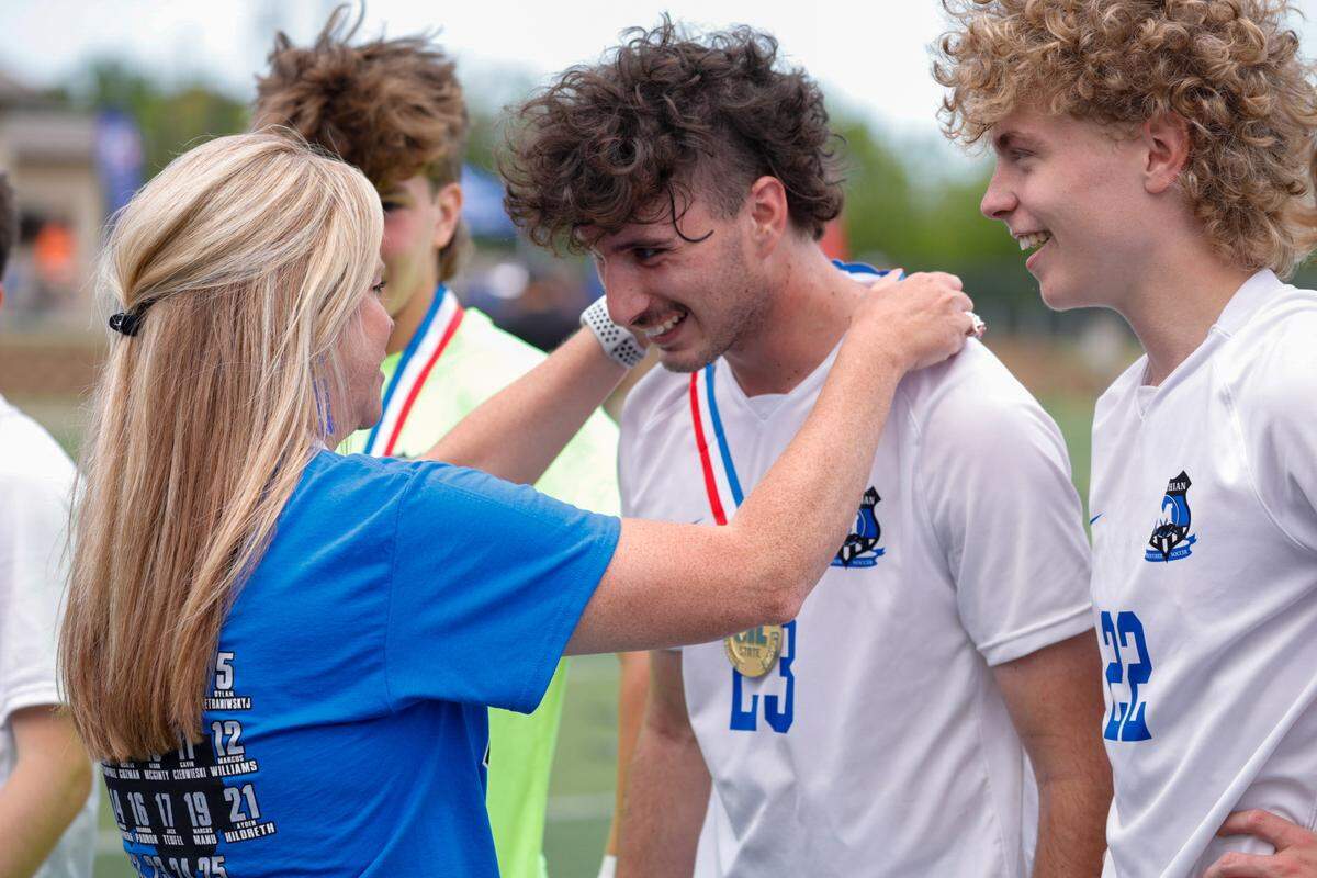 Midlothian’s Landon Exley receives state championship medals following a victory against Frisco Wakeland in the Class 5A title game at Birkelbach Field on April 13, 2024.