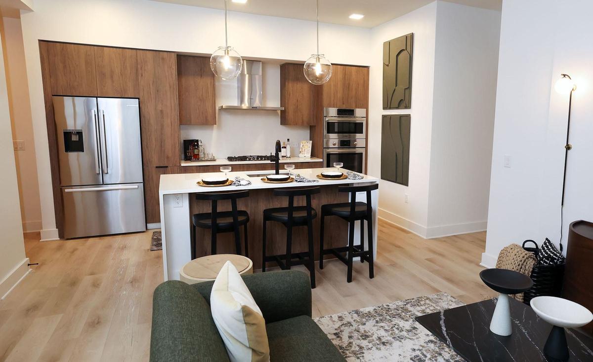 The kitchens of all Crescent Residences have custom Italian cabinets, islands with quartz waterfall counters, gas ranges and brand new Bosch appliances as seen on Wednesday, Sept. 4, 2024, in Fort Worth.