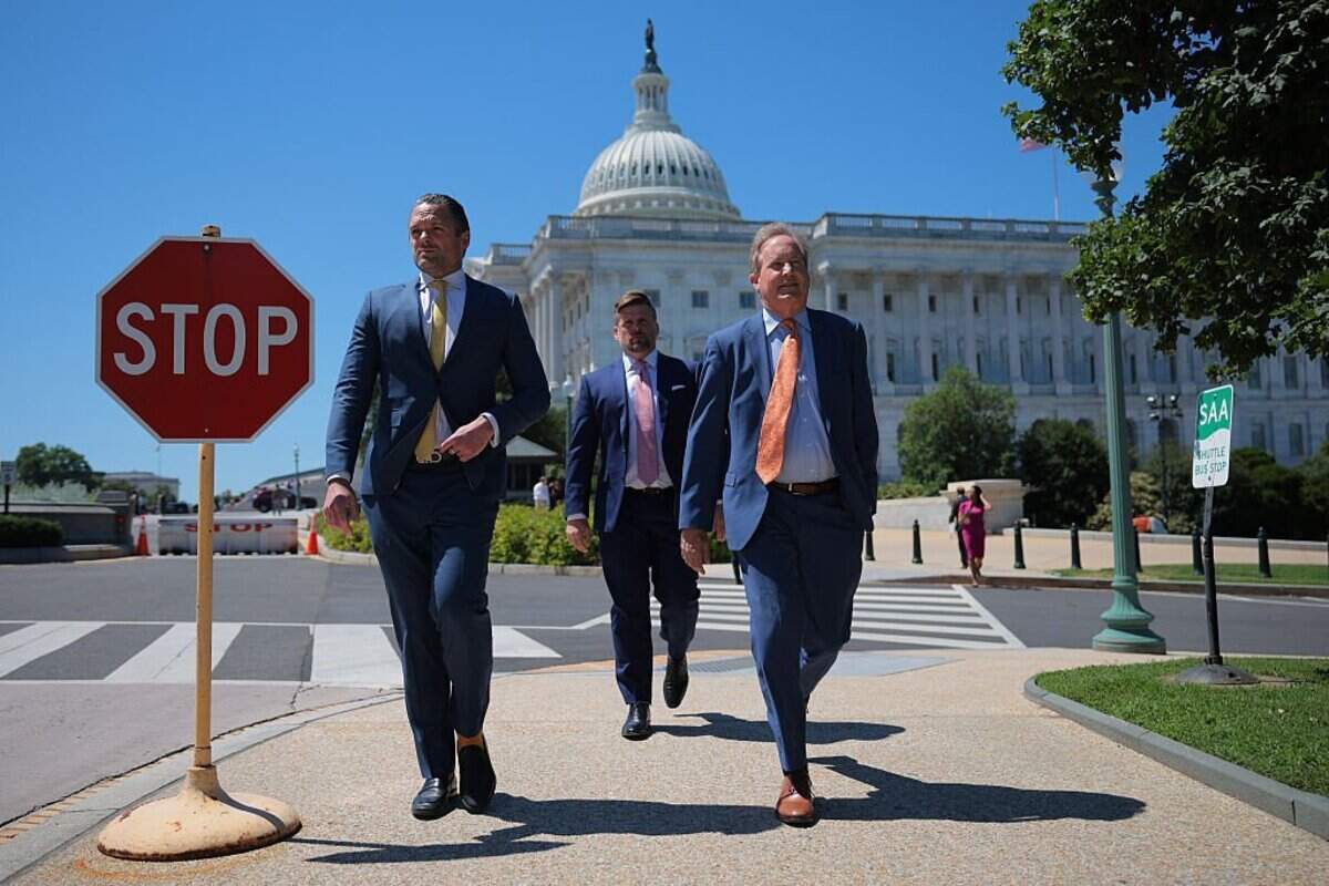 WASHINGTON, DC - JUNE 03: Texas Attorney General Ken Paxton (r) leaves the U.S. Capitol after a meeting with Senate Majority Leader John Thune (R-SD) on June 03, 2026 in Washington, DC. The Republican nominee for U.S. Senate in Texas, Paxton was endorsed by U.S. President Donald Trump. (Photo by Chip Somodevilla/Getty Images)