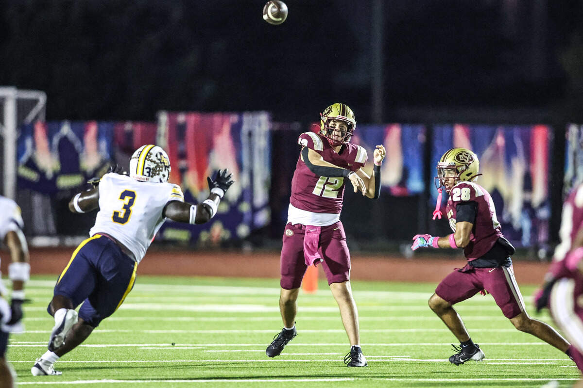 Saginaw quarterback Joshua Greek throws a long touchdown to Kaiden Stewart against Arlington Heights on Thursday, October 10, 2025, at Rough Rider Stadium in Saginaw, Texas.