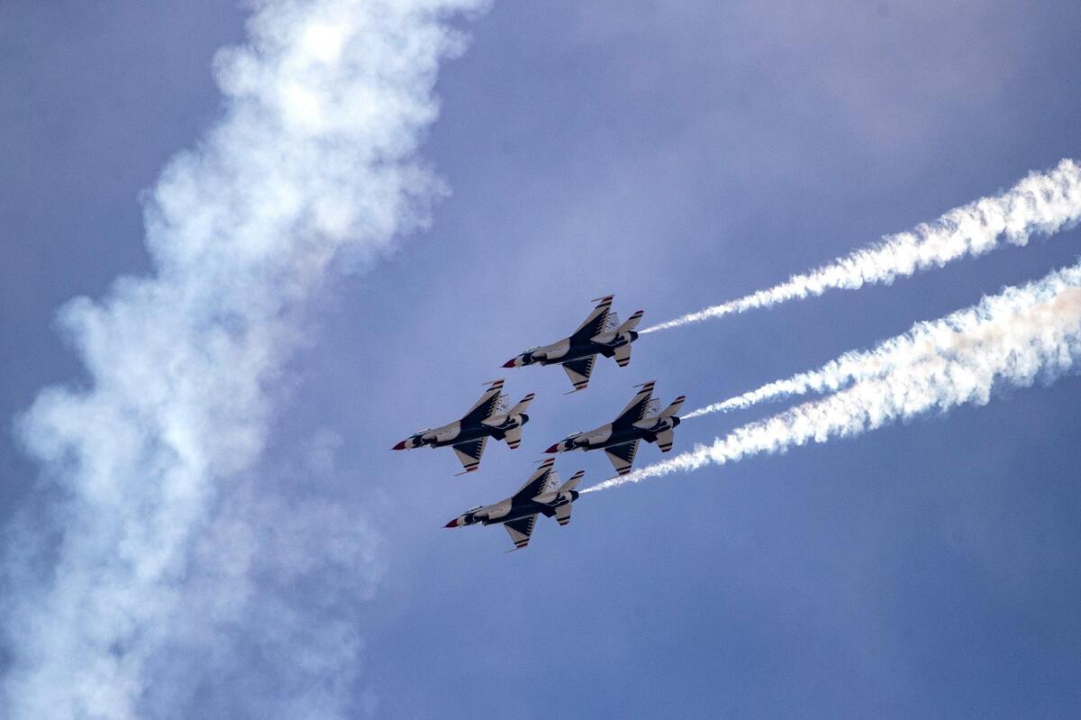 A squadron of U.S. Air Force Thunderbirds blast across the airspace above the Fort Worth Alliance airport during the AllianceTexas Aviation Expo presented by Bell in Fort Worth on Saturday, Oct. 22, 2022.