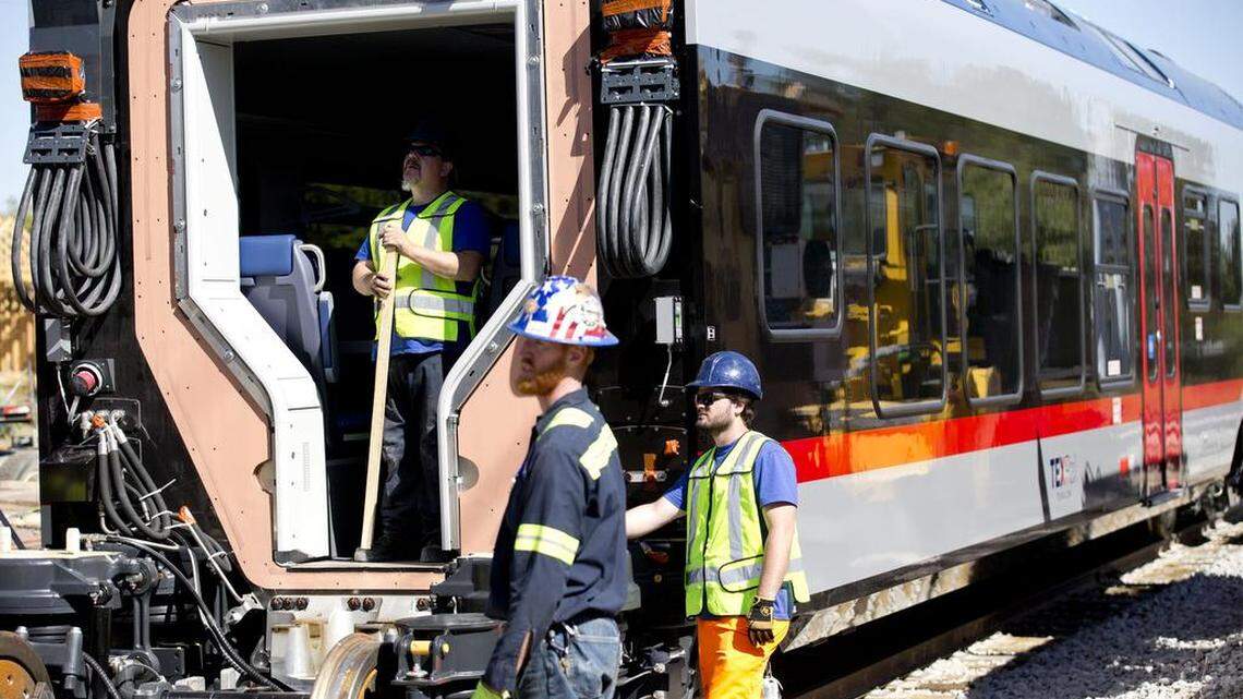 TEXRail cars were unloaded last fall in Grapevine, where much work remains to be done before the passenger rail line can open.