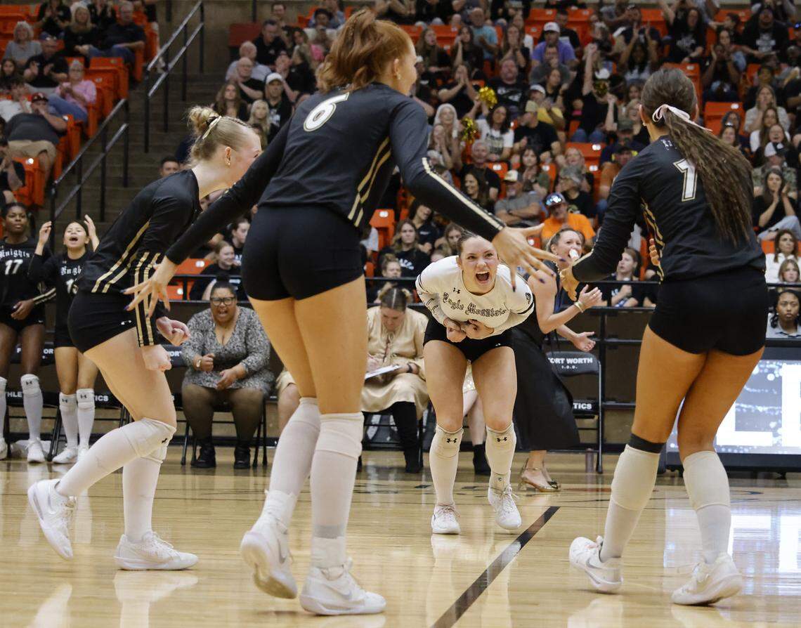 Eagle Mountain defensive specialist Lexi Nichols (4) reacts after a point during the second set of a Class 4A Division II volleyball state semifinal against Longview Spring Hill on Saturday at Wilkerson-Greines Activity Center in Fort Worth.