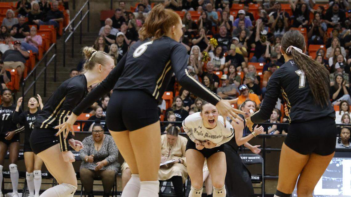 Eagle Mountain defensive specialist Lexi Nichols (4) reacts after a point during the second set of a Class 4A Division II volleyball state semifinal against Longview Spring Hill on Saturday at Wilkerson-Greines Activity Center in Fort Worth.