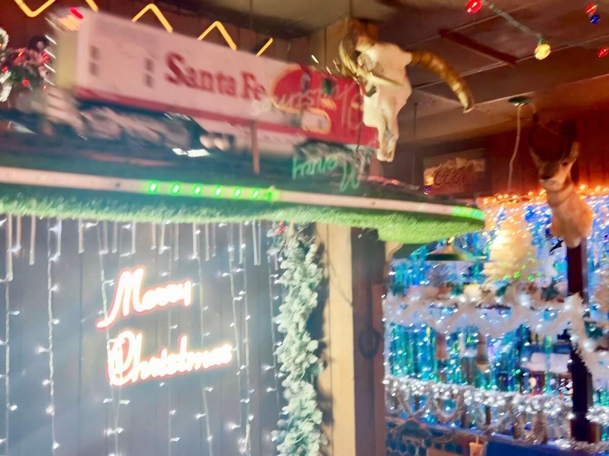 Campo Verde’s train, above, chugs through new Christmas decorations Sept. 9, 2023.