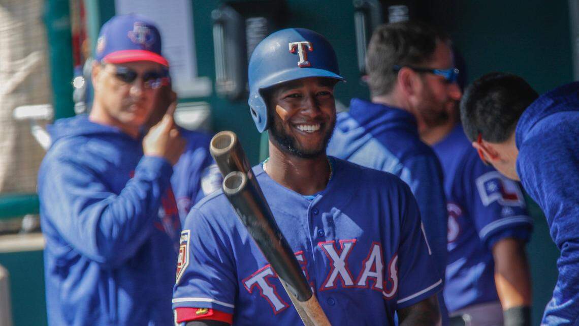 Texas Rangers shortstop Jurickson Profar (19) jokes with teammates in the dugout before the game as the Chicago White Sox beat the Texas Rangers 5-4 at Glendale, Arizona in spring training, Wednesday, February 28, 2018.