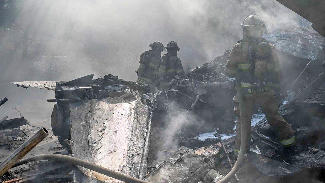 Neighbors say pilot’s suit caught fire as he parachuted from Lake Worth plane crash