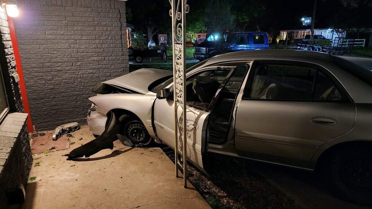 The driver fled the scene after losing control of his car and hitting this White Settlement residence Friday night, officials say. Police are looking for cameras that captured the incident.