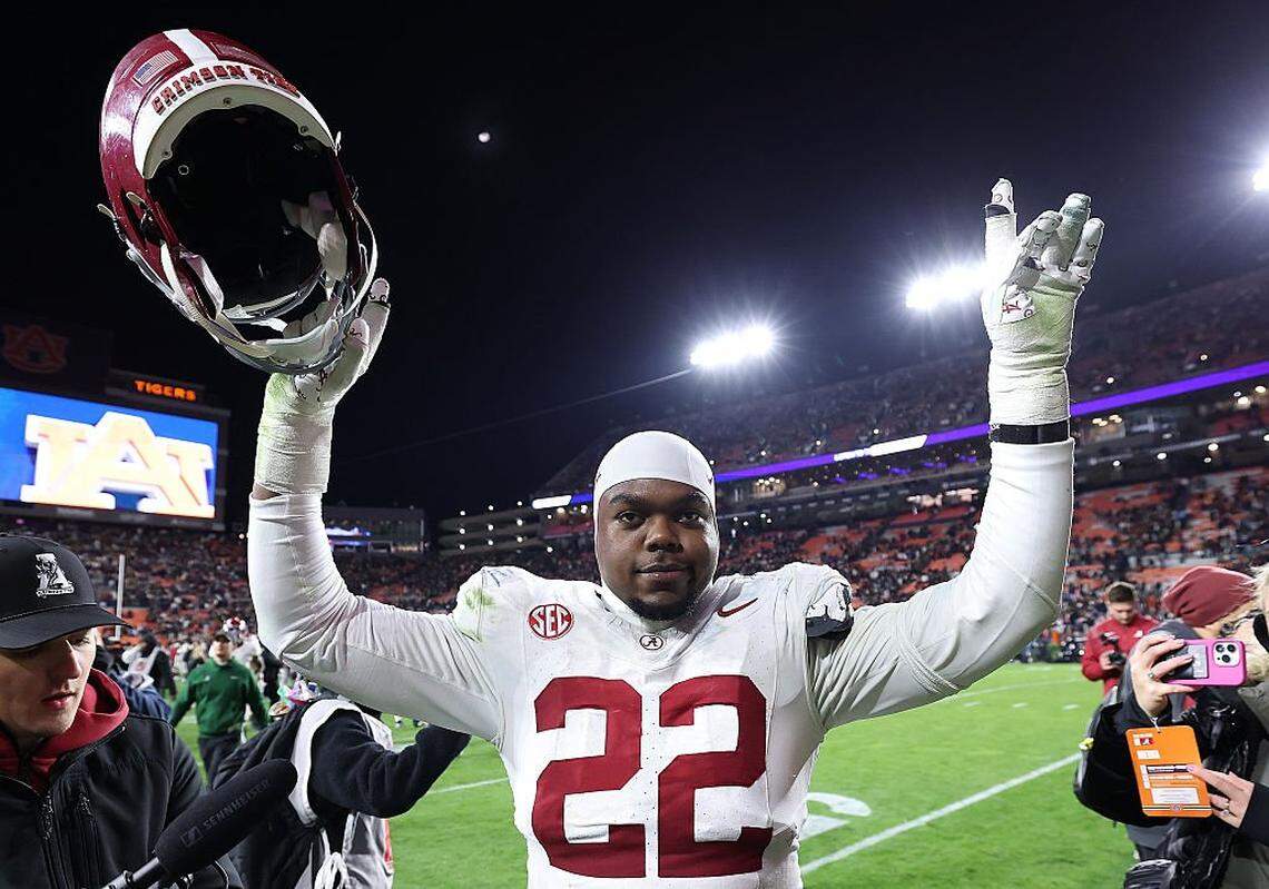 AUBURN, ALABAMA - NOVEMBER 29: Lt Overton #22 of the Alabama Crimson Tide reacts after their 27-20 win over the Auburn Tigers at Jordan-Hare Stadium on November 29, 2025 in Auburn, Alabama. (Photo by Kevin C. Cox/Getty Images)