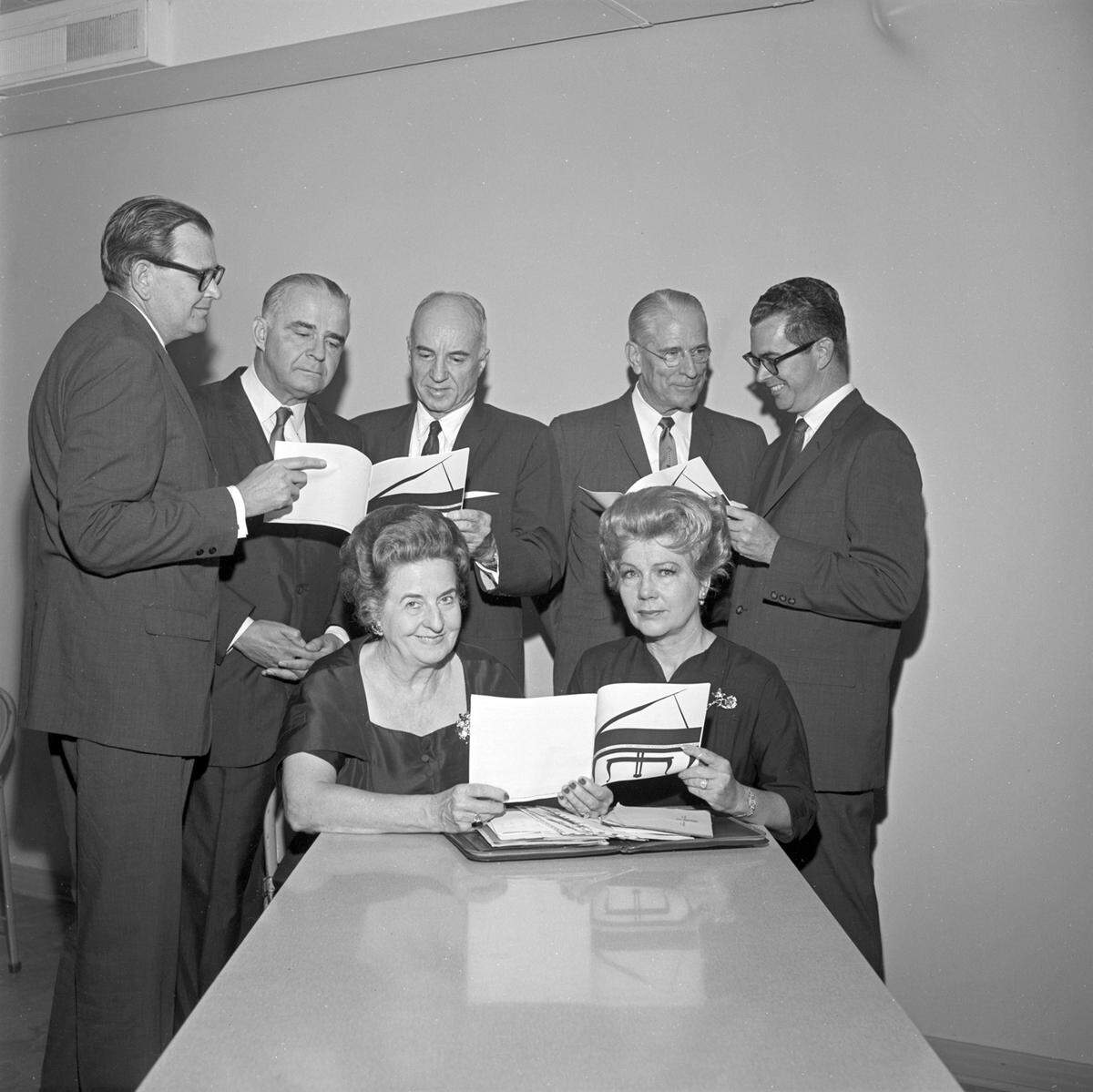 The 1962 members of the executive board of the Van Cliburn International Piano Competition are Mrs. Grace Ward Lankford, seated left, competition chairman; Mrs. Ewell J. Robinett, seated right, and Sam Cantey III, Serge Saxe, Lorin Boswell Jr., Joe A. Clarke and Richard L. Brown, standing left to right.