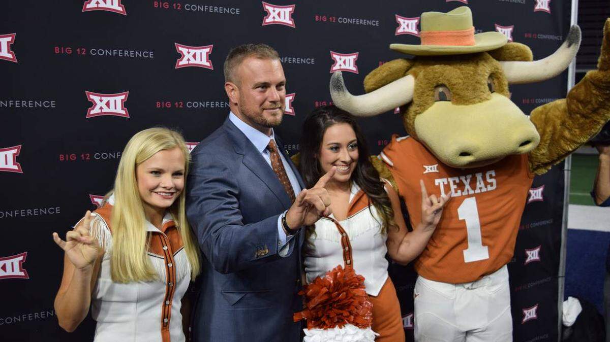 Texas coach Tom Herman sees similarities between Shawn Robinson and Kenny Hill.