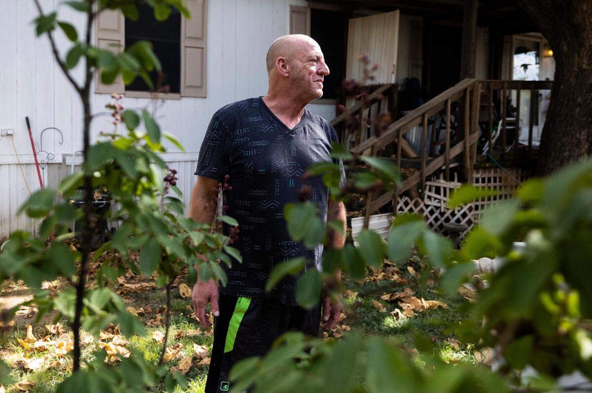Patrick Teague, 59, shows off the plants in his yard at Redwood Estates in southeast Fort Worth.