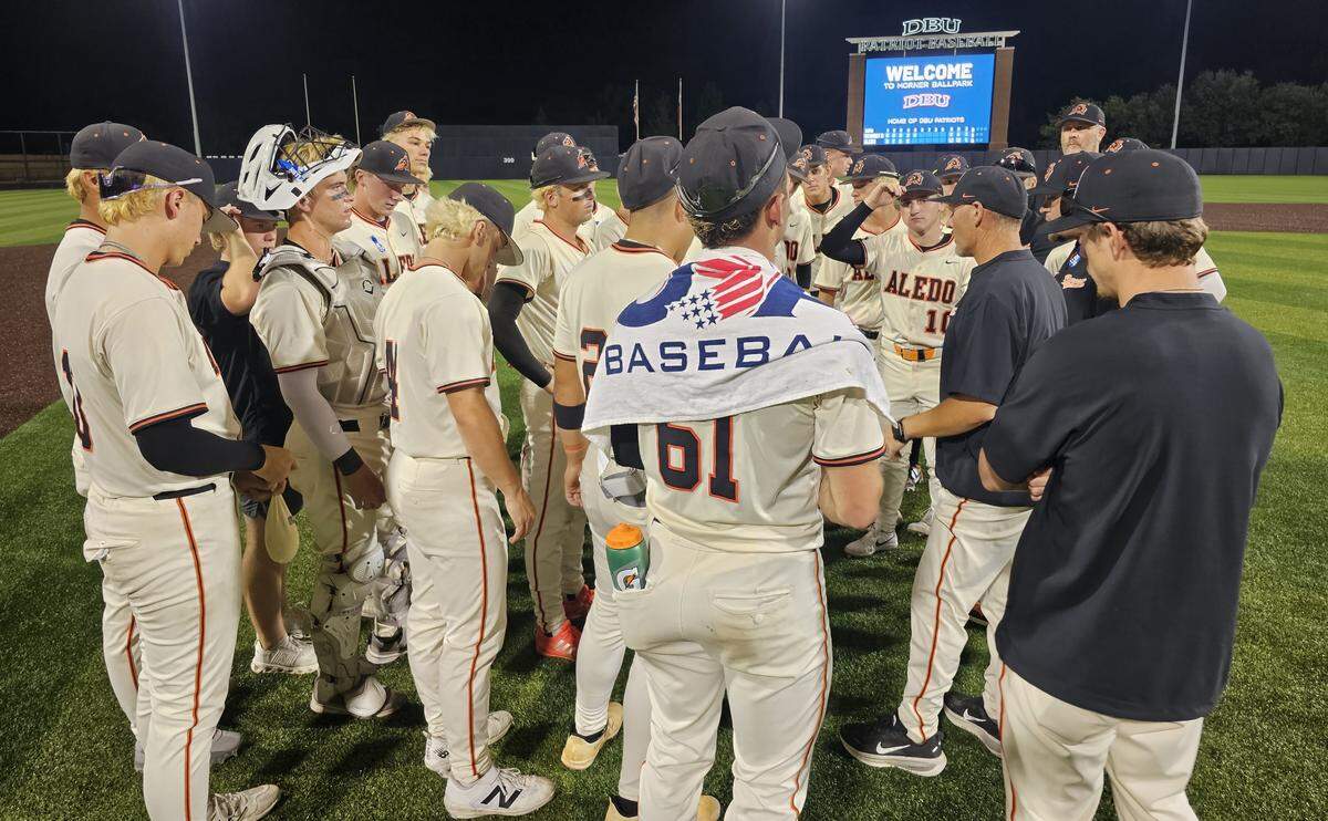 Aledo head coach Chad Barry talks with his squad after the Bearcats run-ruled McKinney North in Game 1 of their UIL Class 5A Division I state semifinal baseball game on Thursday, May 28, 2026, at Horner Ballpark on the Campus of Dallas Baptist University in Dallas, Texas.