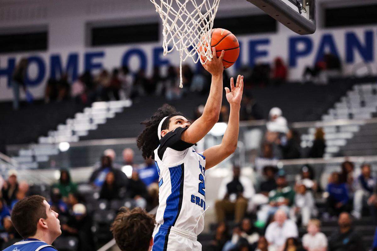 North Crowley guard Isaak Hayes goes up for a layup in a District 3-6A matchup against Weatherford on Friday at North Crowley.
