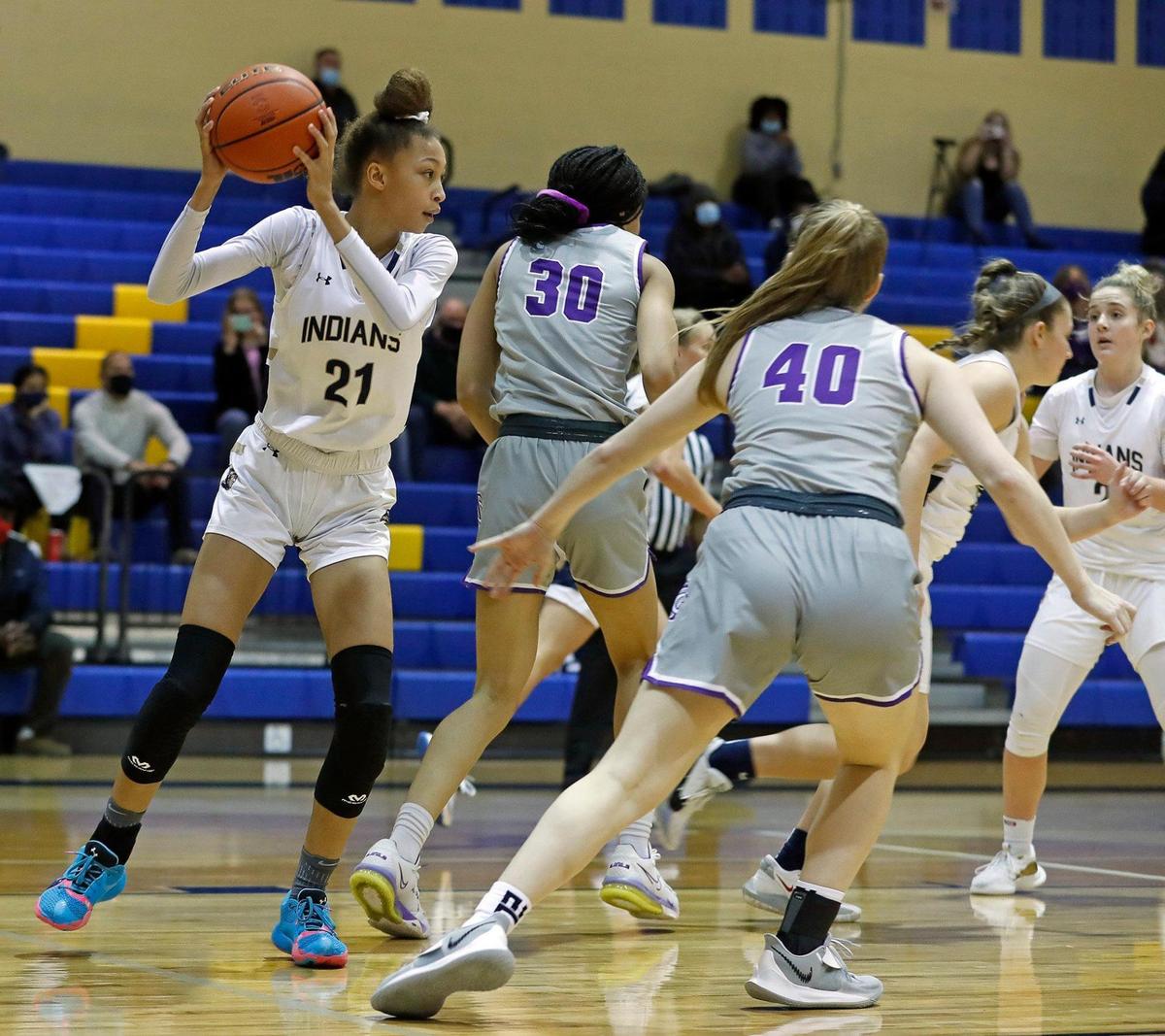 Keller post Mallory McQuietor (21) grabs a rebound under the Timber Creek net in the first half of a 4-6A district high school girls basketball game at Keller High School in Keller, Texas, Thursday, Jan. 28, 2021. Timber Creek led 28-27 at the half. (Special to the Star-Telegram Bob Booth)