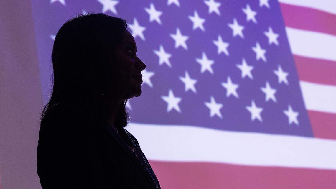 Alisa Simmons, theTarrant County commissioner of Precinct 2, sits on stage as U.S. Rep. Marc Veasey, D-Texas, speaks to the capacity crowd during ‘The People vs. The Power Grab’ rally at the Ridglea Theater in Fort Worth on Aug. 9, 2025.
