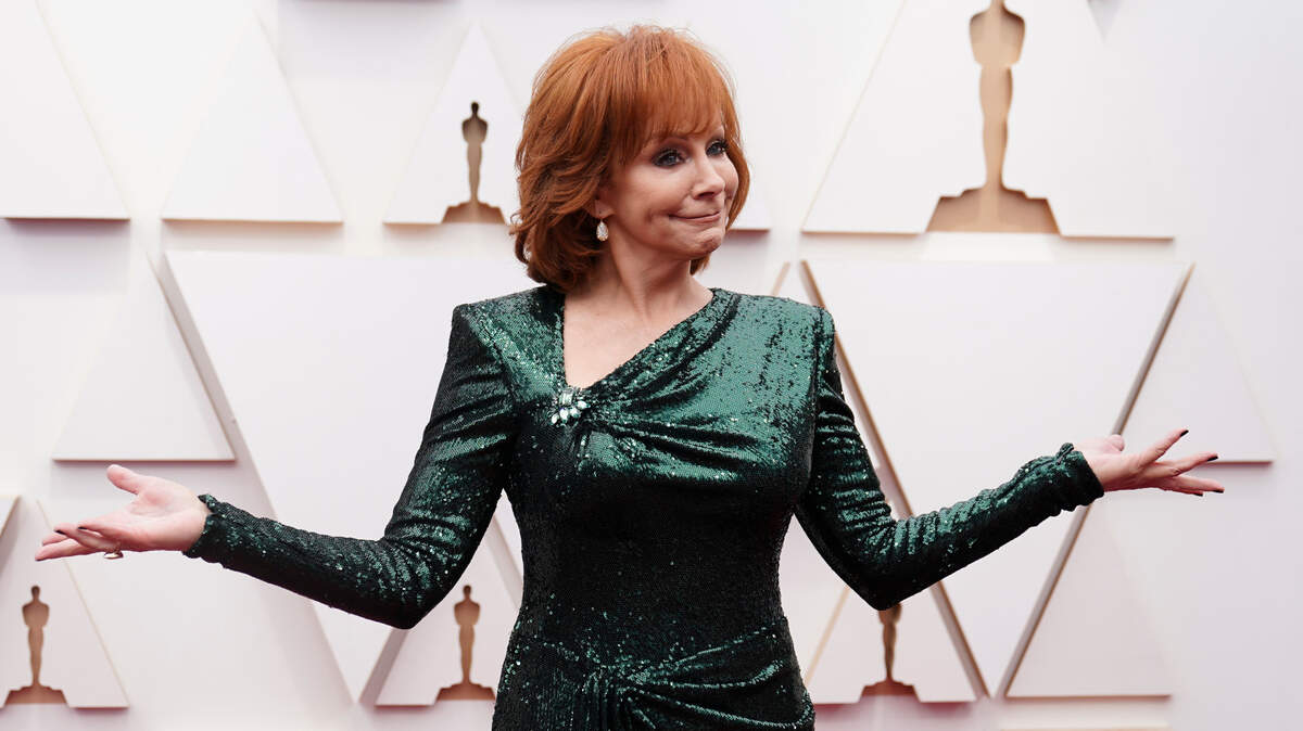 Reba McEntire, seen here at the Oscars ceremony in March, will play Dickies Arena in Fort Worth on Oct. 14.