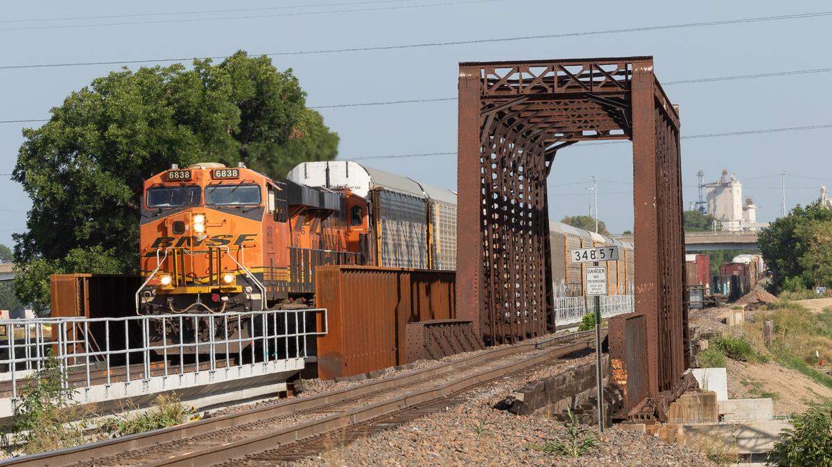 BNSF completed the first track of a double track project on a bridge spanning the Trinity River. The second track will begin construction after the demolition of a steel bridge. The project is expected to be completed in early 2024.