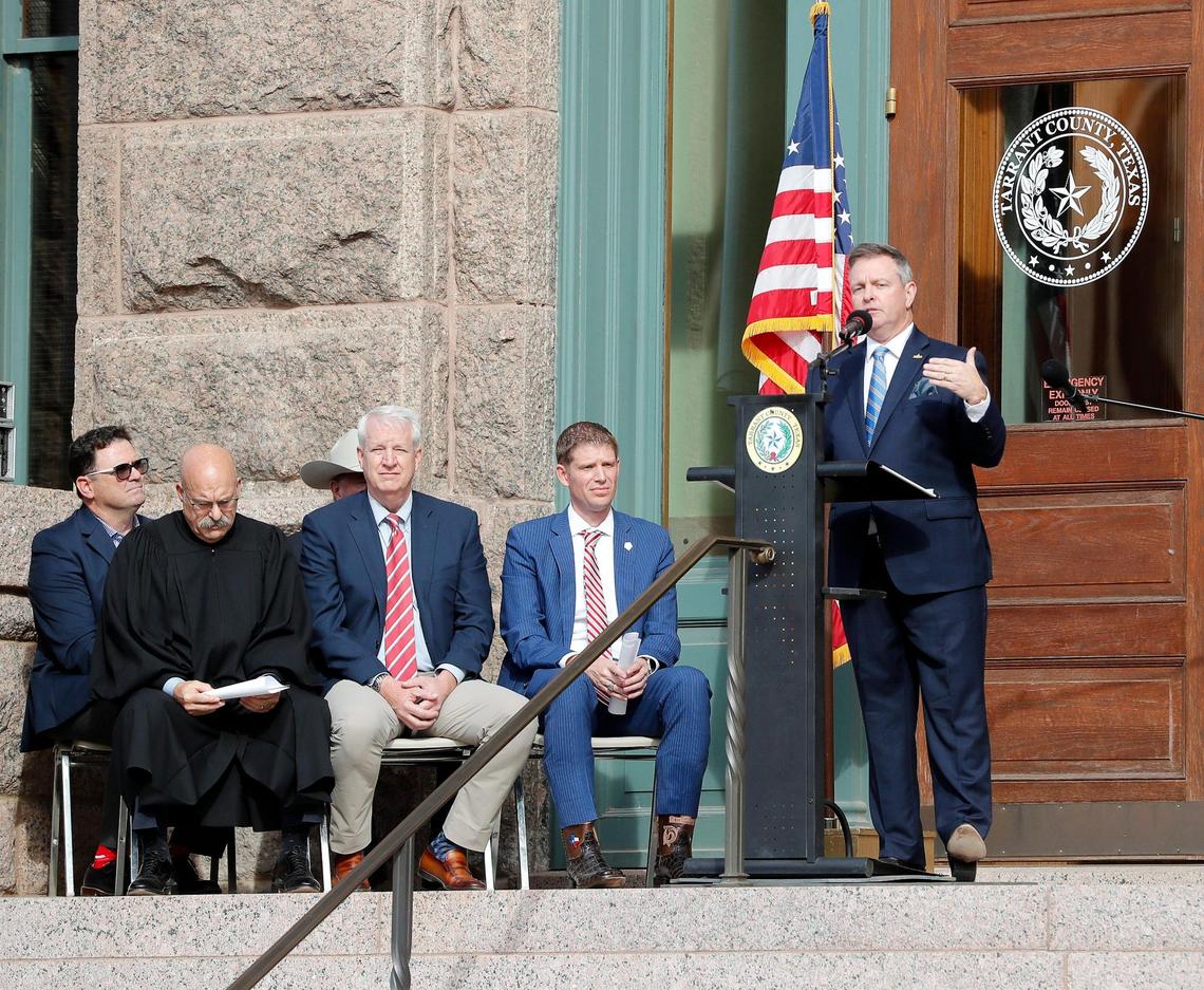 Judge Tim O’Hare addresses the crowd after being sworn in as a Tarrant County judge on Sunday. “I will listen and I will try to learn and I don’t have all the answers and I don’t pretend to have all the answers,” he said.