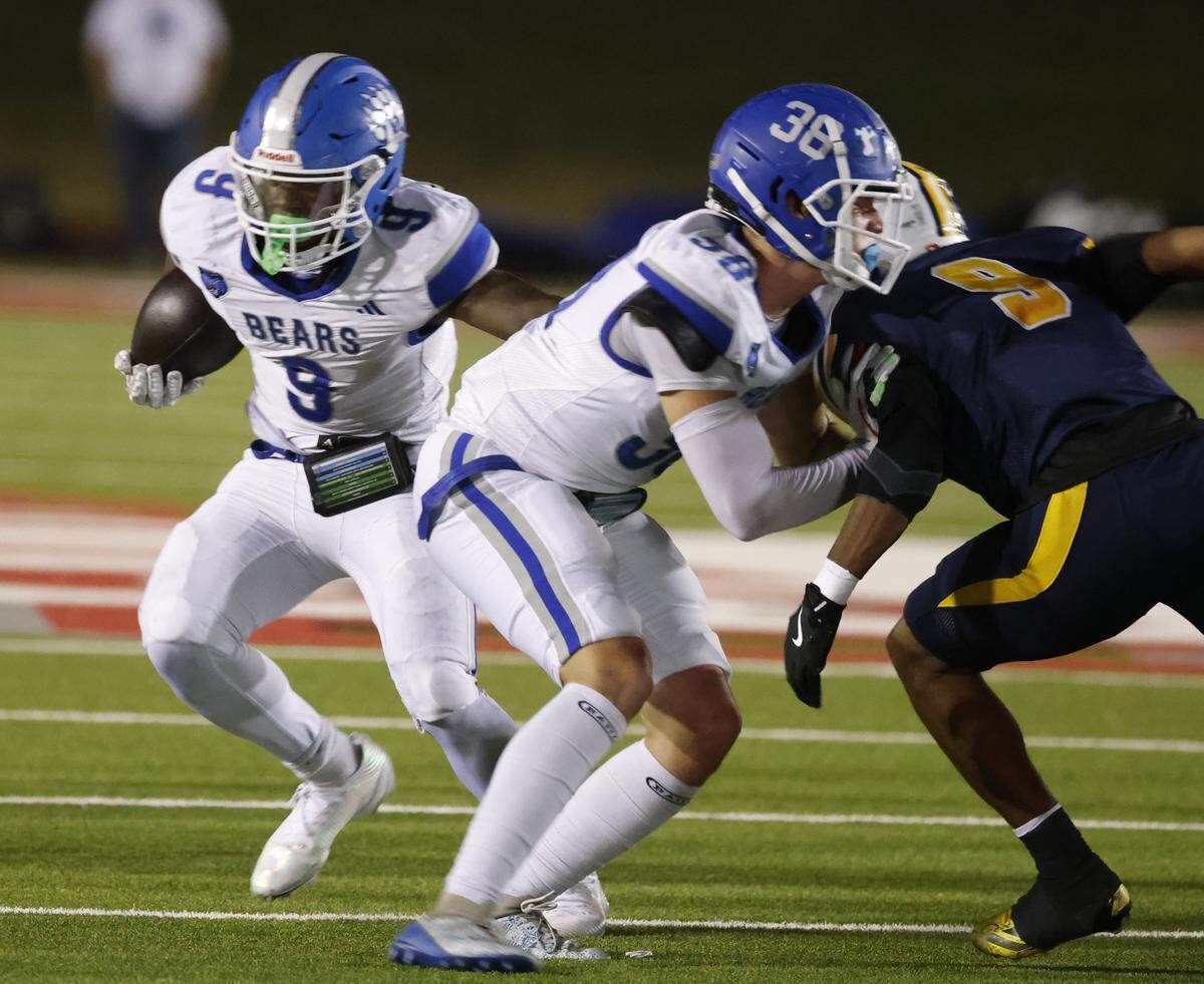Brewer running back Kameron Coleman (9) finds a hole behind his lead blocker, tight end Carson Miller (38), during the first half of a UIL Conference 5A D1 Bi-District playoff game between Arlington Heights and Brewer at Farrington Field in Fort Worth, Texas, Friday, Nov. 14, 2025.