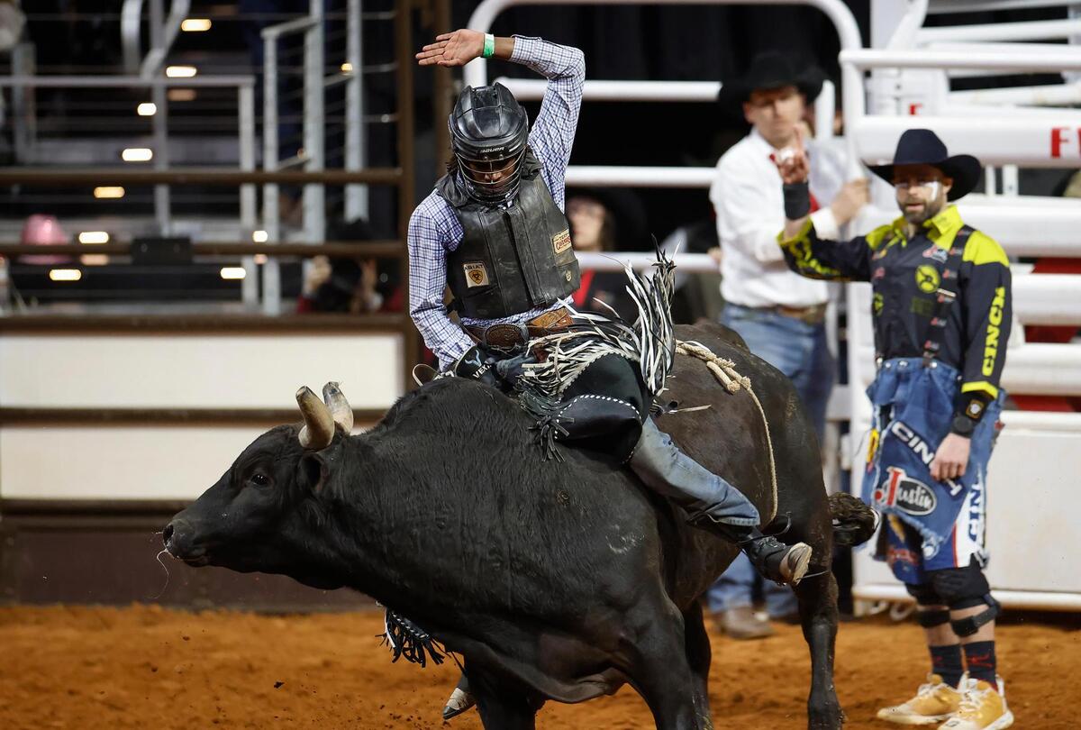 Avontis Williams competes in the bull riding event of the Cowboys Color Rodeo on Monday, Jan. 20, 2025, at the Fort Worth Stock Show & Rodeo.