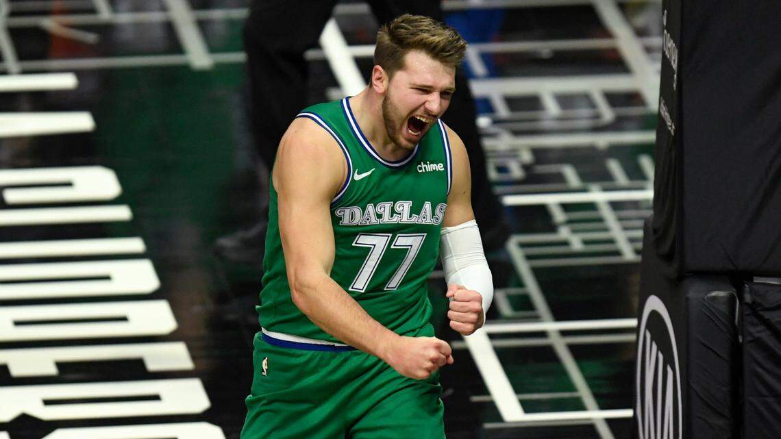 Dallas Mavericks guard Luka Doncic celebrates a basket during a 51-point rout of the Clippers in Los Angeles back in December. The Mavs will start return there for the start of the playoffs on Saturday.. (AP Photo/Kyusung Gong)