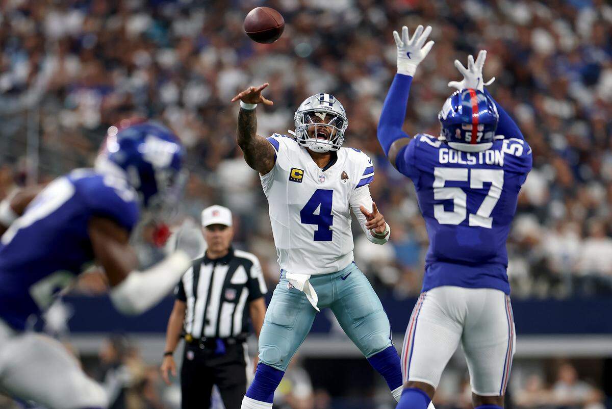 Dallas Cowboys quarterback Dak Prescott throws the ball against the New York Giants on Sunday at AT&T Stadium in Arlington.