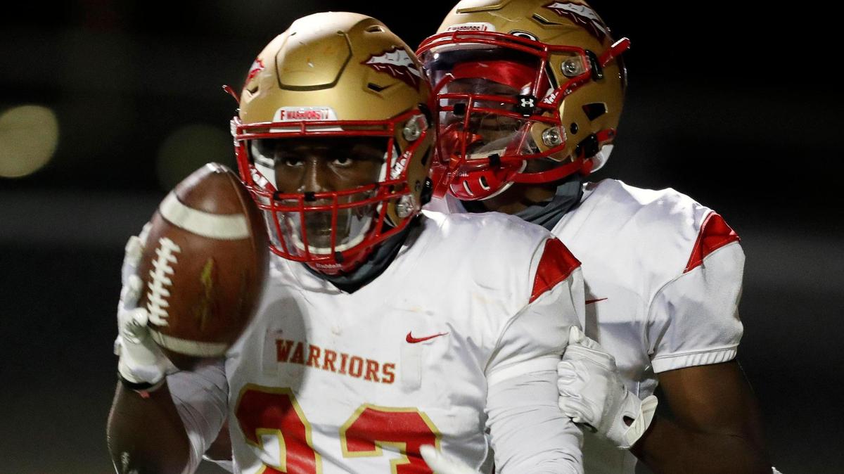 South Grand Prairie running back Javarius Crawford (23) and the Warriors play Arlington on Friday. (Special to the Star-Telegram Bob Booth)