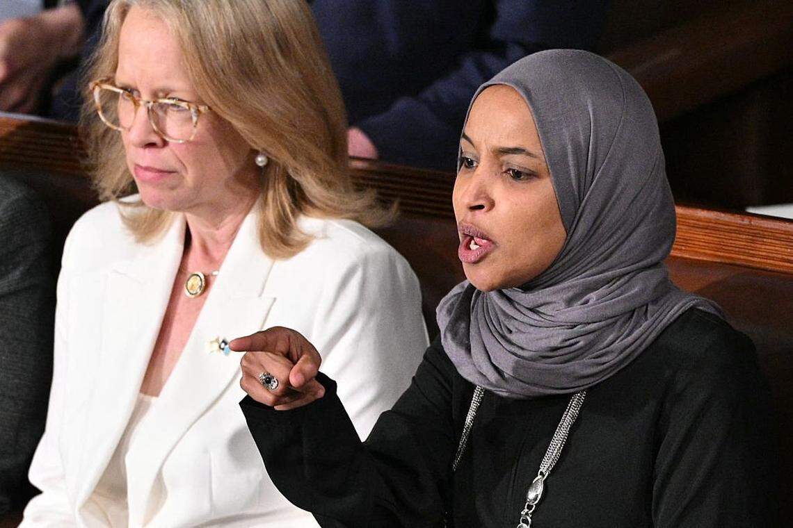 US Representative Ilhan Omar, Democrat from Minnesota, reacts as US President Donald Trump delivers the State of the Union address in the House Chamber of the US Capitol in Washington, DC, on Feb. 24, 2026. (Photo by Mandel NGAN / AFP via Getty Images)