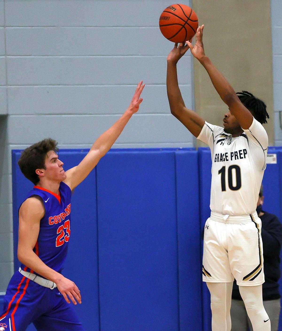Arlington Grace Prep guard Justin McNelkan (10) shoots over Colleyville Covenant forward Austin Scheets (23) during the second half of a TAPPS 4A Regional Round Boys Basketball playoff game played on March 6, 2021 at Brewer High School in Fort Worth TX. (Steve Nurenberg Special to the Star-Telegram)