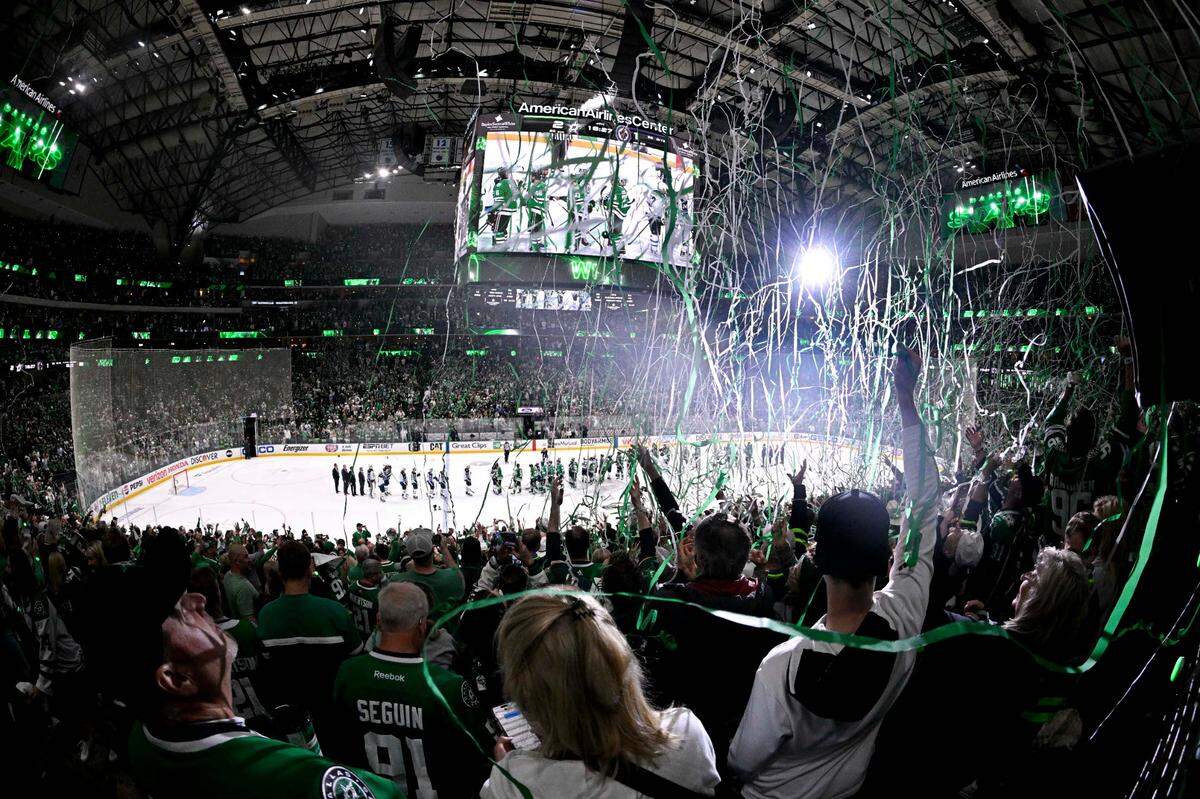 May 17, 2025; Dallas, Texas, USA; The Dallas Stars fans celebrate after the Stars defeat the Winnipeg Jets in the overtime period in game six of the second round of the 2025 Stanley Cup Playoffs at American Airlines Center. Mandatory Credit: Jerome Miron-Imagn Images