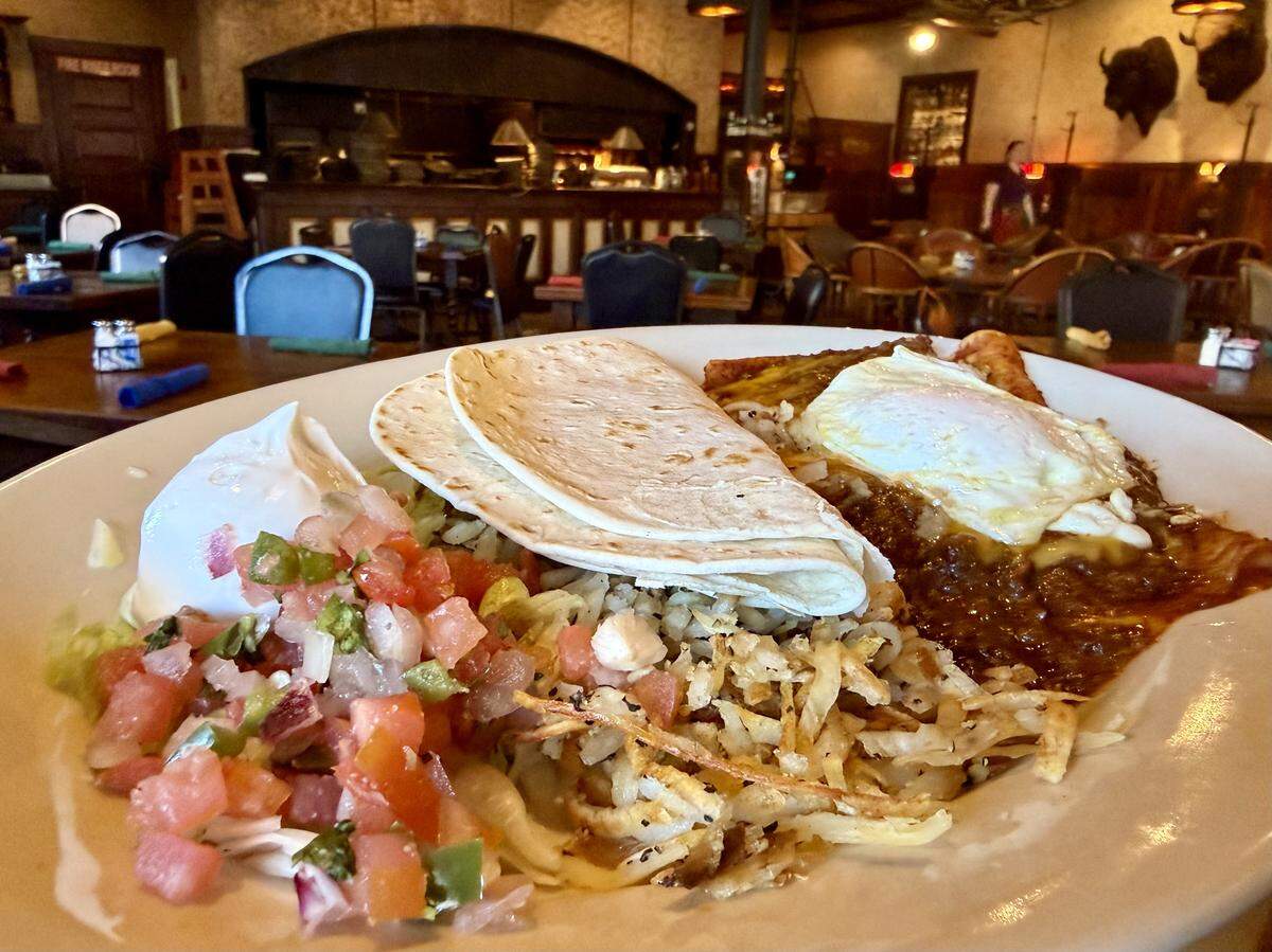 Enchiladas, hash browns and eggs are on the weekend breakfast menu at Hunter Brothers’ H3 Ranch grill in the Stockyards Hotel, as seen Nov. 15, 2025.