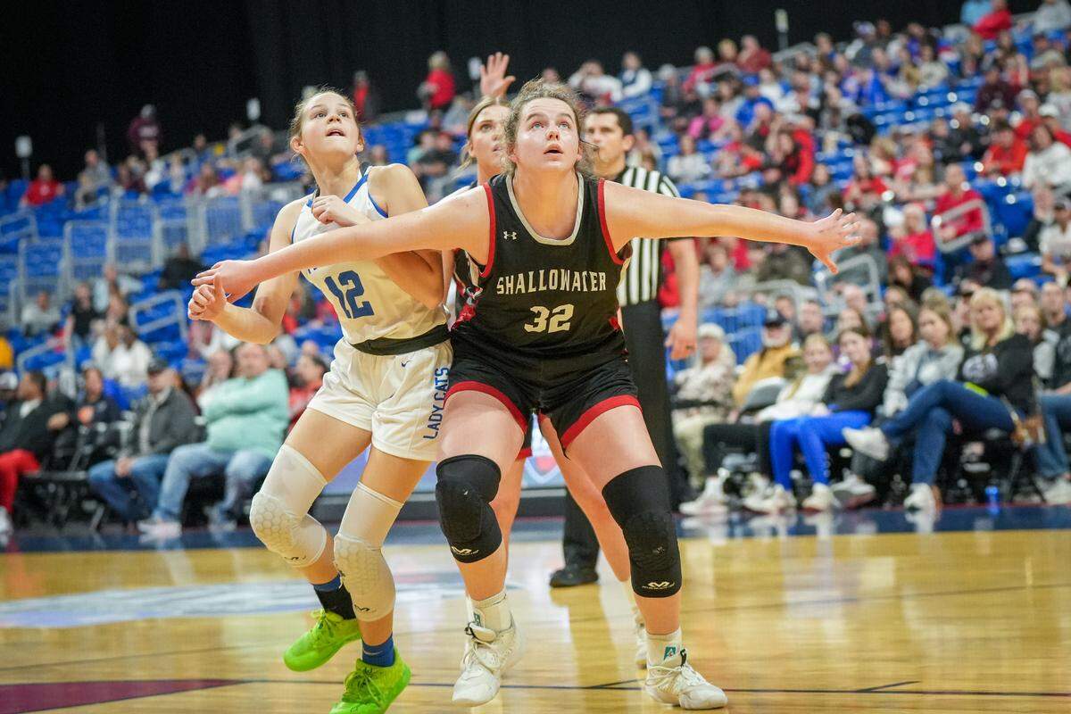 Shallowater’s Addison Pitts (32) blocks out Emory Rains’ Kenzy Thompson in a Class 3A state semifinal on Thursday, February 29, 2024 at the Alamodome in San Antonio, Texas. Shallowater stunned No. 3 Rains 59-47.
